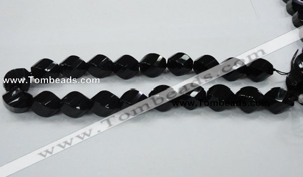 CAB337 15.5 inches 15*20mm faceted & twisted rice black agate beads