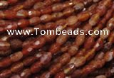 CAG597 15.5 inches 4*6mm faceted rice natural fire agate beads