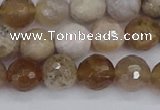 CAG9854 15.5 inches 8mm faceted round ocean fossil agate beads