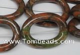 CFG271 15.5 inches 24*30mm carved oval unakite gemstone beads