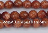 CGS471 15.5 inches 6mm faceted round goldstone beads wholesale