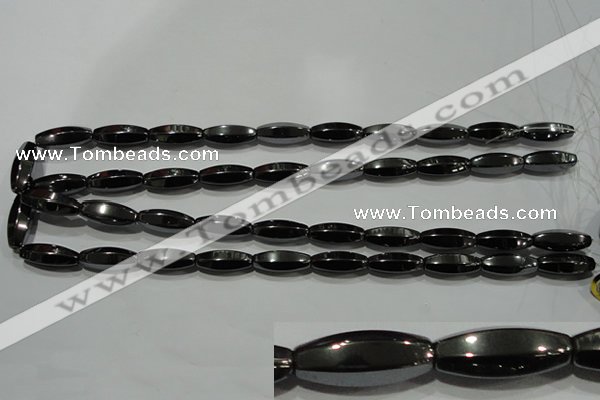 CHE141 15.5 inches 8*20mm faceted rice hematite beads wholesale