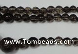 CRO743 15.5 inches 6mm – 14mm faceted round smoky quartz beads