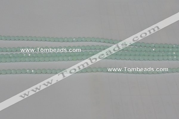 CTU2571 15.5 inches 4mm faceted round synthetic turquoise beads
