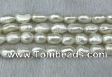 FWP285 15 inches 9mm - 10mm baroque white freshwater pearl strands
