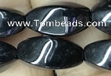 CAA2483 15.5 inches 8*16mm twisted rice black agate beads