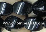 CAA2486 15.5 inches 10*14mm twisted rice black agate beads