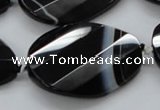 CAA285 28*38mm twisted & faceted teardrop black line agate beads