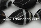 CAA286 22*30mm twisted & faceted oval black line agate beads