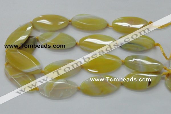 CAA325 15.5 inches 25*50mm faceted marquise yellow line agate beads