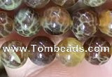 CAA5036 15.5 inches 4mm round yellow dragon veins agate beads