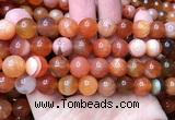 CAA6154 15 inches 12mm round orange Botswana agate beads
