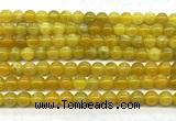 CAA6277 15 inches 6mm round yellow fire agate beads