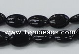 CAB318 15.5 inches 8*12mm oval black agate gemstone beads wholesale