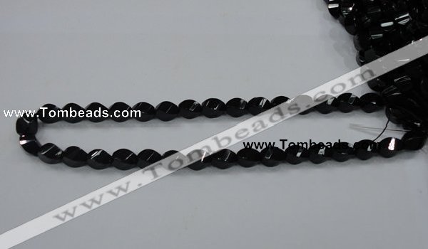 CAB335 15.5 inches 8*12mm faceted & twisted rice black agate beads