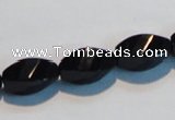 CAB796 15.5 inches 8*16mm faceted & twisted rice black agate beads