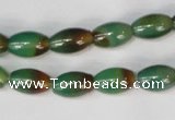 CAG1008 15.5 inches 8*12mm rice rainbow agate beads wholesale