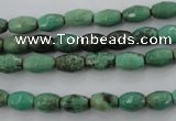 CAG1605 15.5 inches 6*9mm faceted rice green grass agate beads