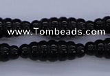 CAG1695 15.5 inches 10*30mm carved rice black agate beads