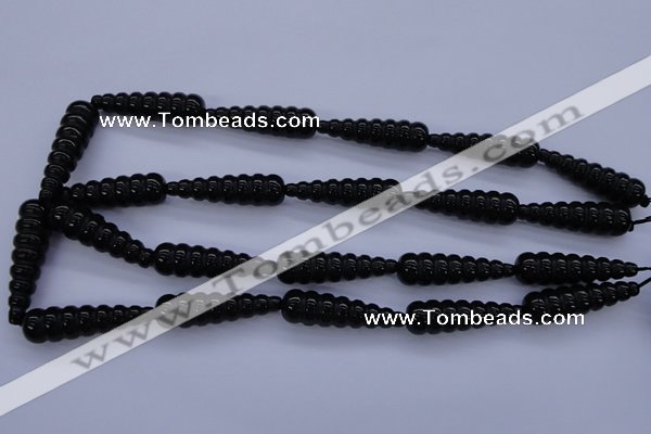 CAG1697 15.5 inches 10*35mm carved teardrop black agate beads