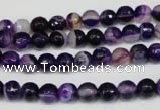 CAG2094 15.5 inches 6mm faceted round purple line agate beads