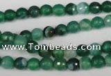 CAG2112 15.5 inches 6mm faceted round green line agate beads