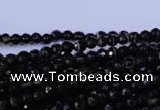 CAG2312 15.5 inches 4mm faceted round black line agate beads