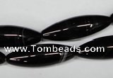 CAG2969 15.5 inches 10*30mm rice black line agate beads