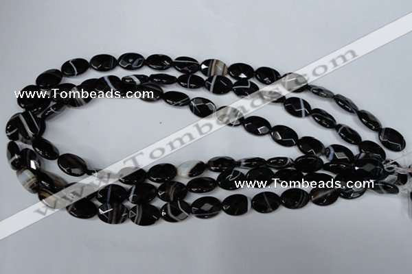 CAG3081 15.5 inches 10*14mm faceted oval black line agate beads