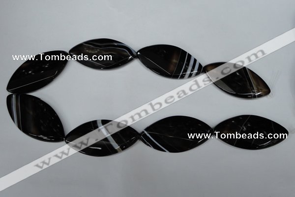 CAG3095 15.5 inches 25*50mm faceted & twisted oval black line agate beads