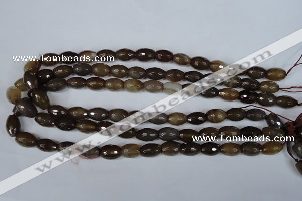 CAG3129 15.5 inches 10*14mm faceted rice brown line agate beads