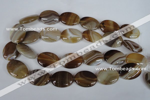 CAG3131 15.5 inches 10*14mm oval brown line agate beads