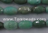 CAG3918 15.5 inches 6*10mm faceted rice green grass agate beads