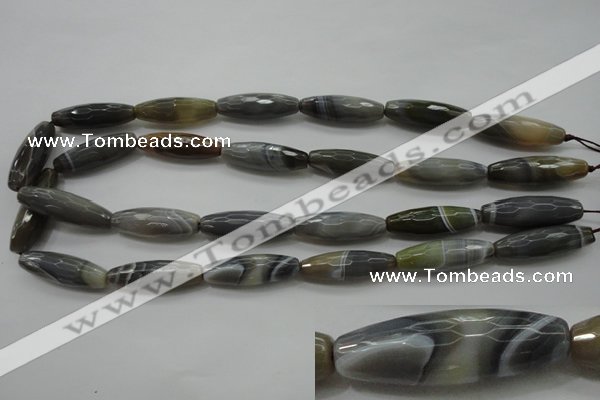 CAG3958 15.5 inches 10*30mm faceted rice grey botswana agate beads