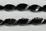 CAG4009 15.5 inches 8*16mm faceted & twisted rice black agate beads