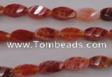 CAG4180 15.5 inches 6*12mm faceted & twisted rice natural fire agate beads