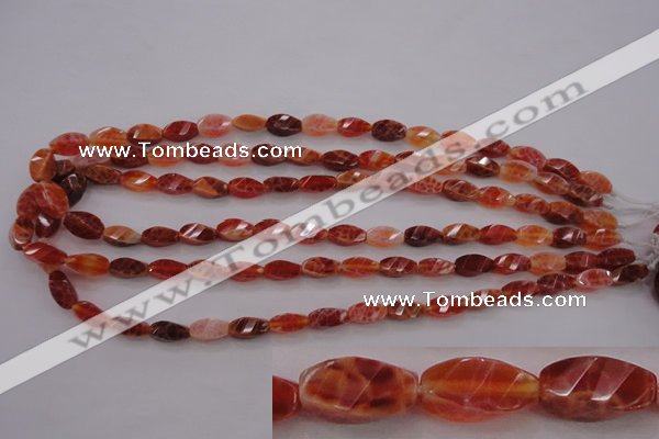 CAG4180 15.5 inches 6*12mm faceted & twisted rice natural fire agate beads