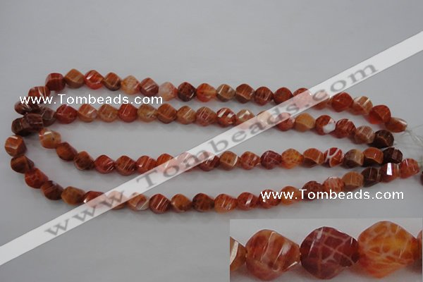 CAG580 15.5 inches 8*10mm faceted & twisted rice natural fire agate beads