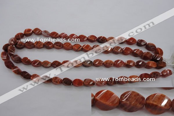 CAG581 15.5 inches 8*12mm faceted & twisted rice natural fire agate beads