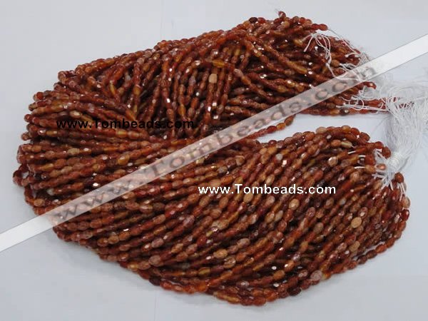 CAG597 15.5 inches 4*6mm faceted rice natural fire agate beads