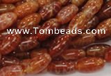 CAG605 15.5 inches 8*14mm rice natural fire agate beads wholesale