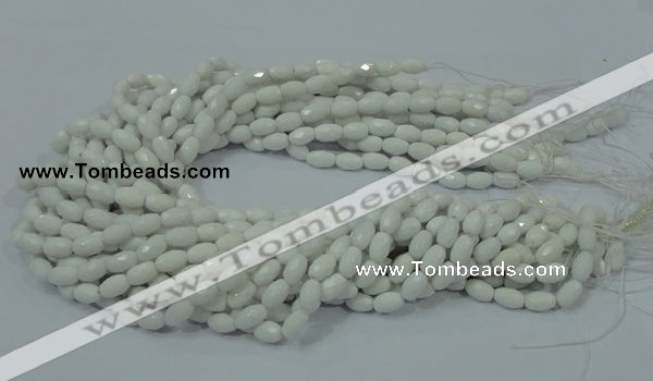 CAG720 15.5 inches 6*8mm faceted rice white agate gemstone beads