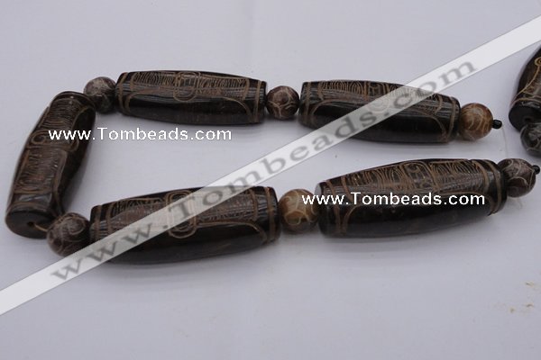 CAL04 14.5 inches 25*60mm carved drum agalmatolite beads