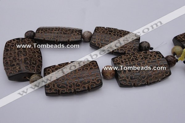 CAL20 14.5 inches 42*59mm carved flat drum agalmatolite beads