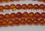 CAR111 15.5 inches 4mm round natural amber beads