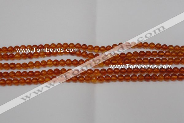 CAR111 15.5 inches 4mm round natural amber beads