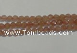 CBQ07 15.5 inches 4mm faceted round strawberry quartz beads