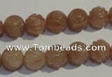 CBQ14 15.5 inches 10mm carved round strawberry quartz beads