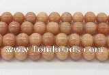 CCA517 15.5 inches 12mm round peach calcite gemstone beads