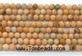 CCA551 15.5 inches 6mm round peach calcite gemstone beads